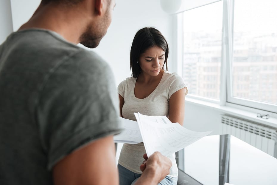 Couple discussing bills debt collection FCCPA Consumer Collections Law